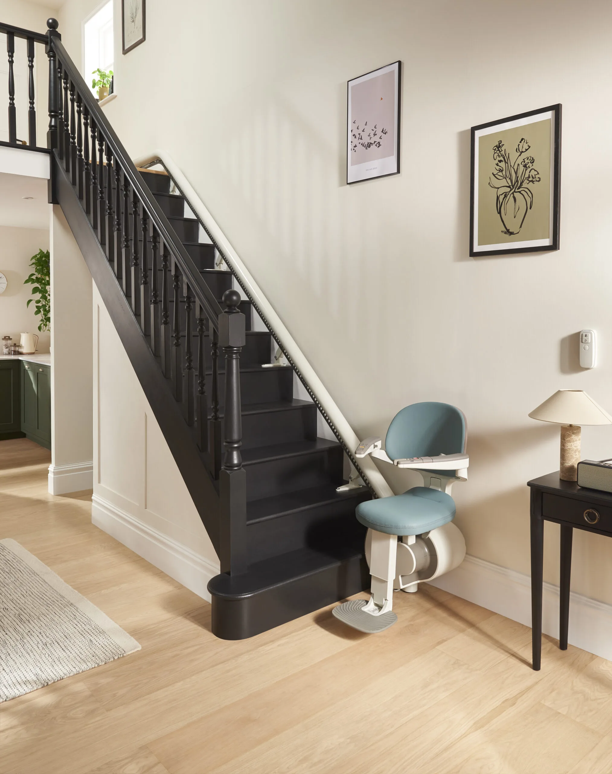 Straight stairlift fitted neatly on stairs inside a Cardiff home